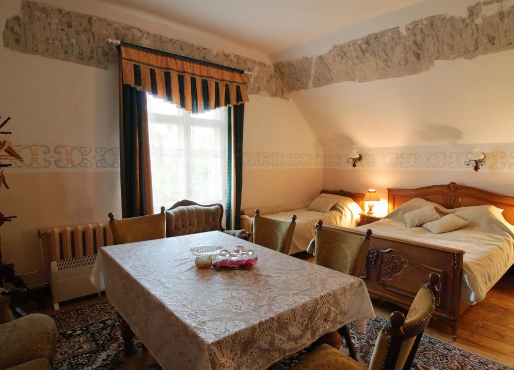 Postel nebo postele na pokoji v ubytování Cantervilla Castle