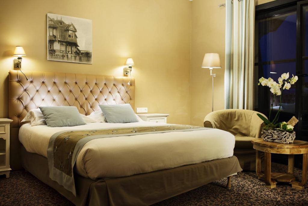 Кровать или кровати в номере Les Jardins d'Hardelot