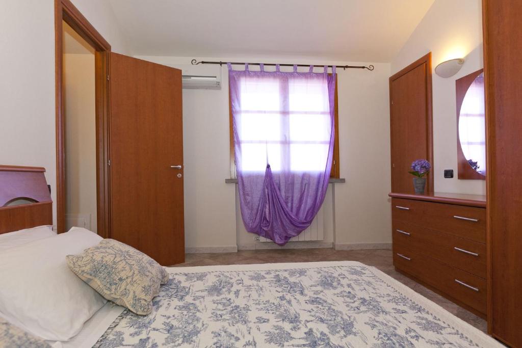 Postel nebo postele na pokoji v ubytování Borgo Guglielmo