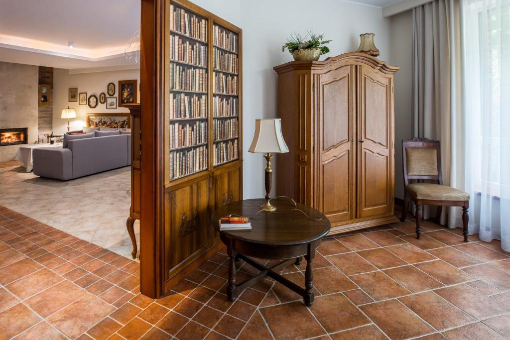 Posteľ alebo postele v izbe v ubytovaní Apartament Perła Kartuz z sauną