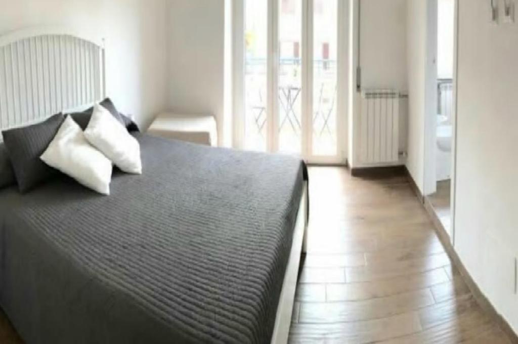 Posteľ alebo postele v izbe v ubytovaní La casa di Alice