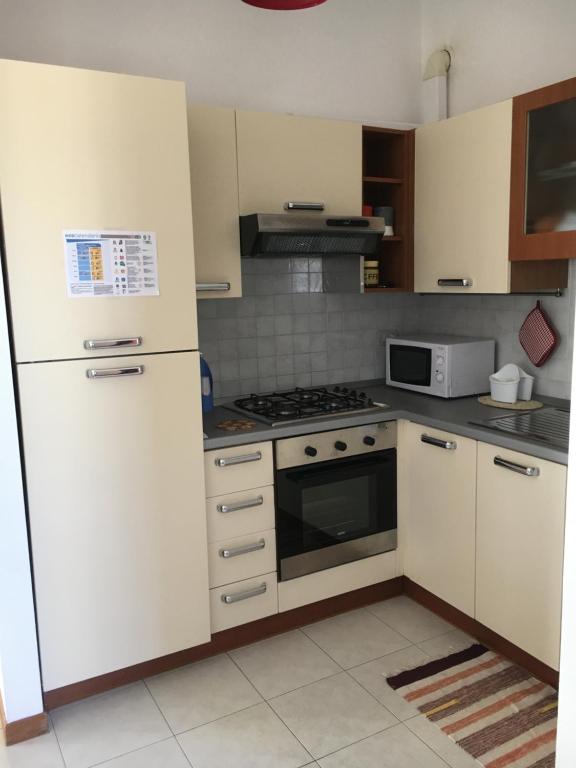 Kuchnia lub aneks kuchenny w obiekcie Residence IL PORTO