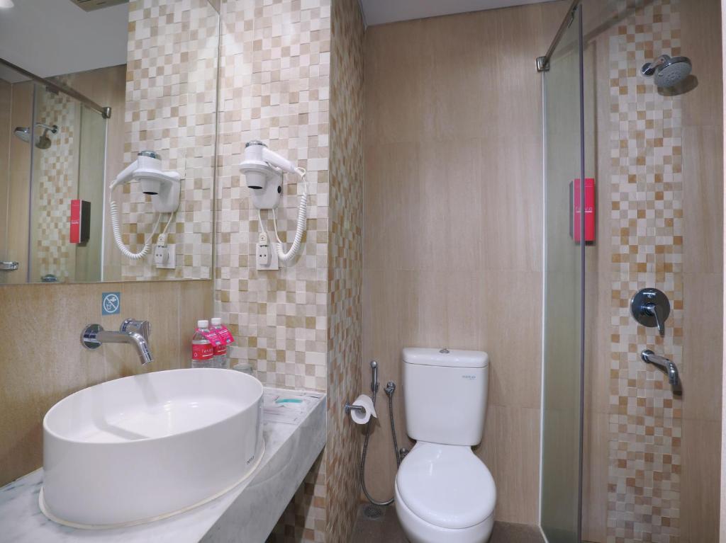 Koupelna v ubytování favehotel Malioboro - Yogyakarta