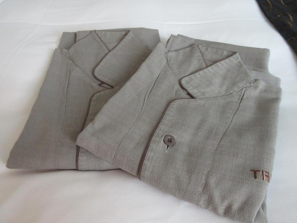 a close up of a gray shirt on a table at Hotel Trusty Osaka Abeno in Osaka