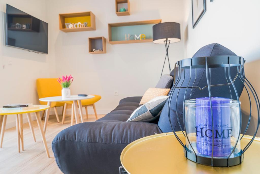 TV a/nebo společenská místnost v ubytování Apartamentos Dubamar