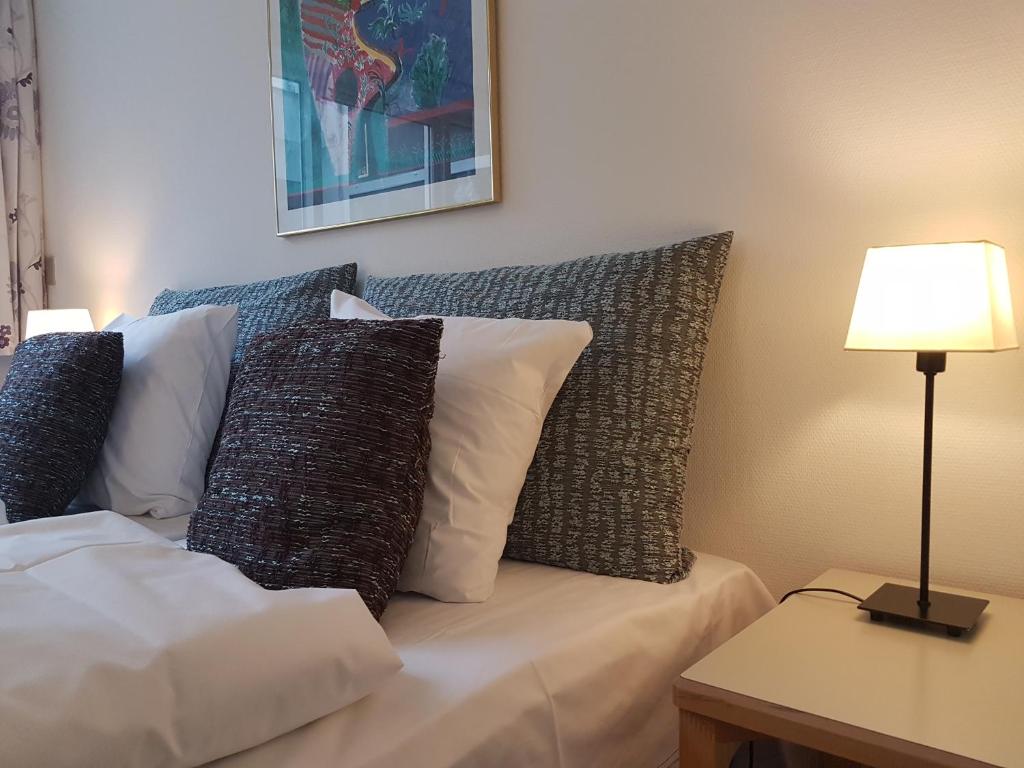 Postel nebo postele na pokoji v ubytování Hotel Strandparken