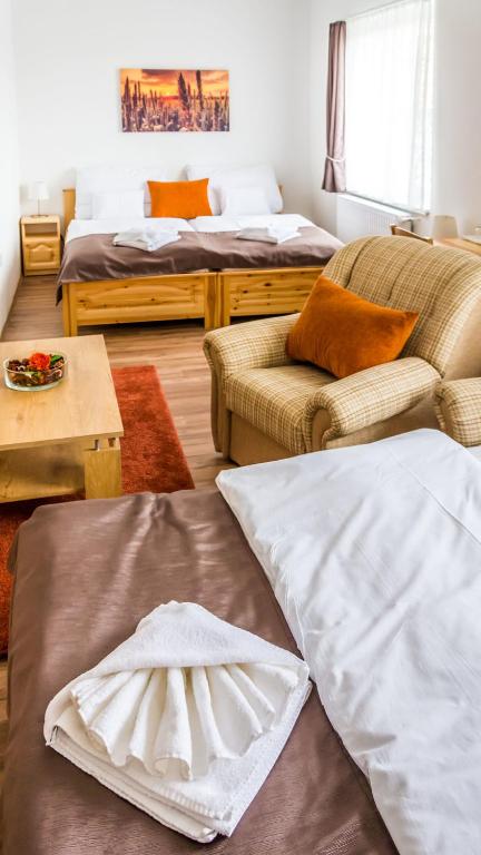 Posteľ alebo postele v izbe v ubytovaní Land-Plan Hotel