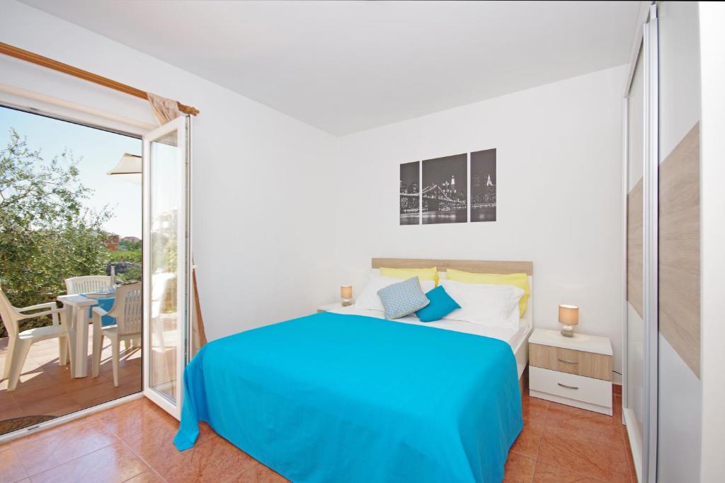 Postel nebo postele na pokoji v ubytování Apartments Imgrund