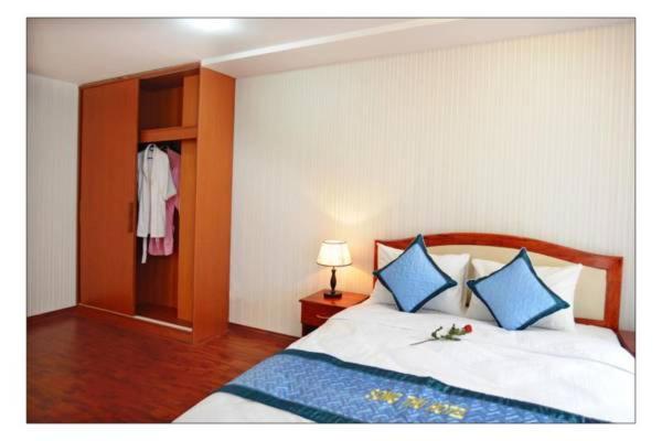 Postel nebo postele na pokoji v ubytování Song Thu hotel