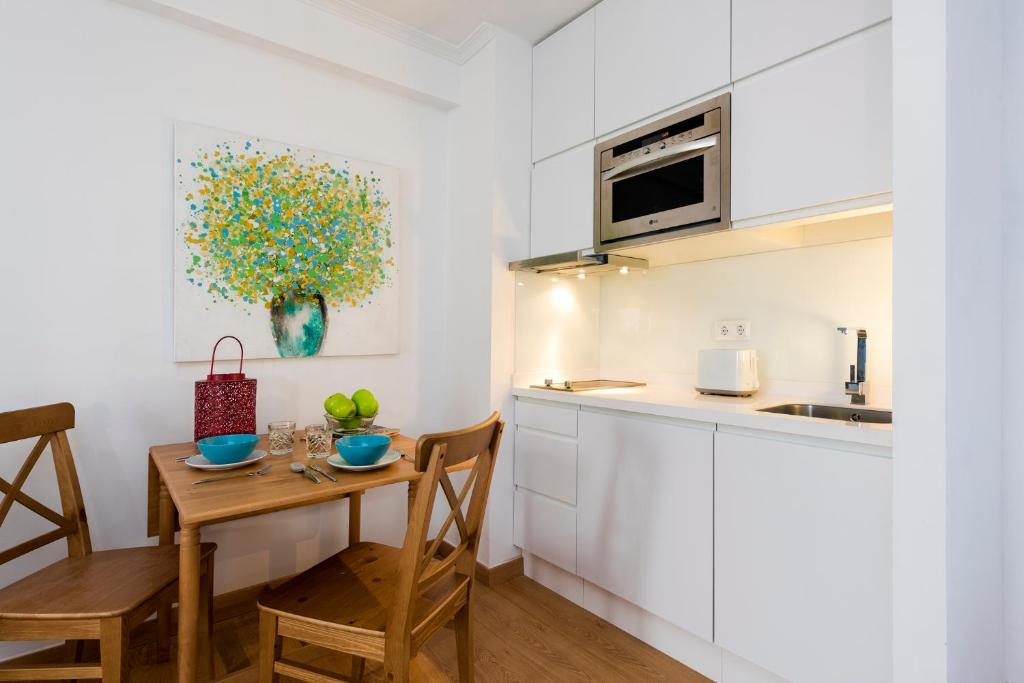 Kuchyň nebo kuchyňský kout v ubytování Genteel Home Giralda