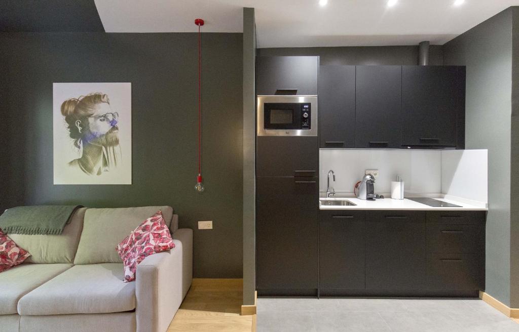 Kuchyňa alebo kuchynka v ubytovaní Apartamentos Ele San Justo Plaza