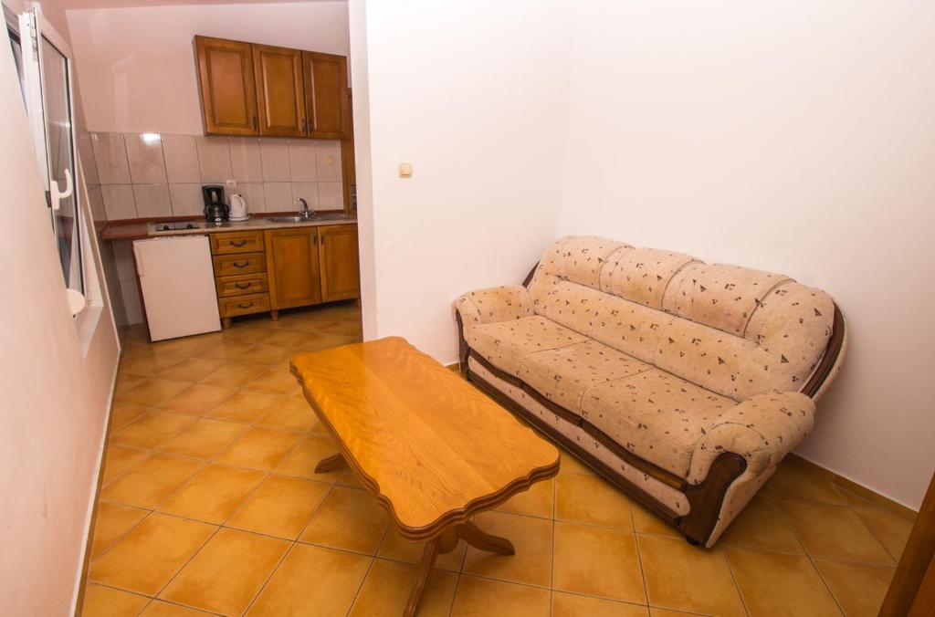 Kuchyň nebo kuchyňský kout v ubytování Apartments De Lara