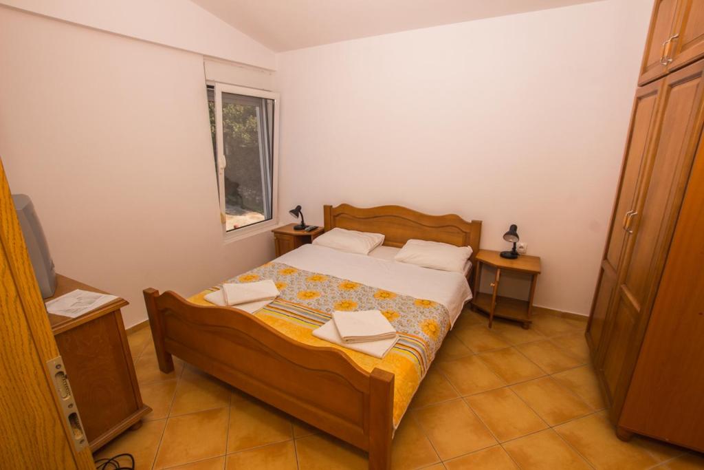 Postel nebo postele na pokoji v ubytování Apartments De Lara