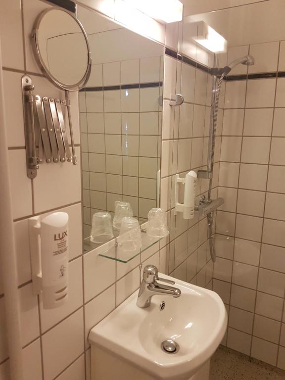 Koupelna v ubytování Hotel Strandparken