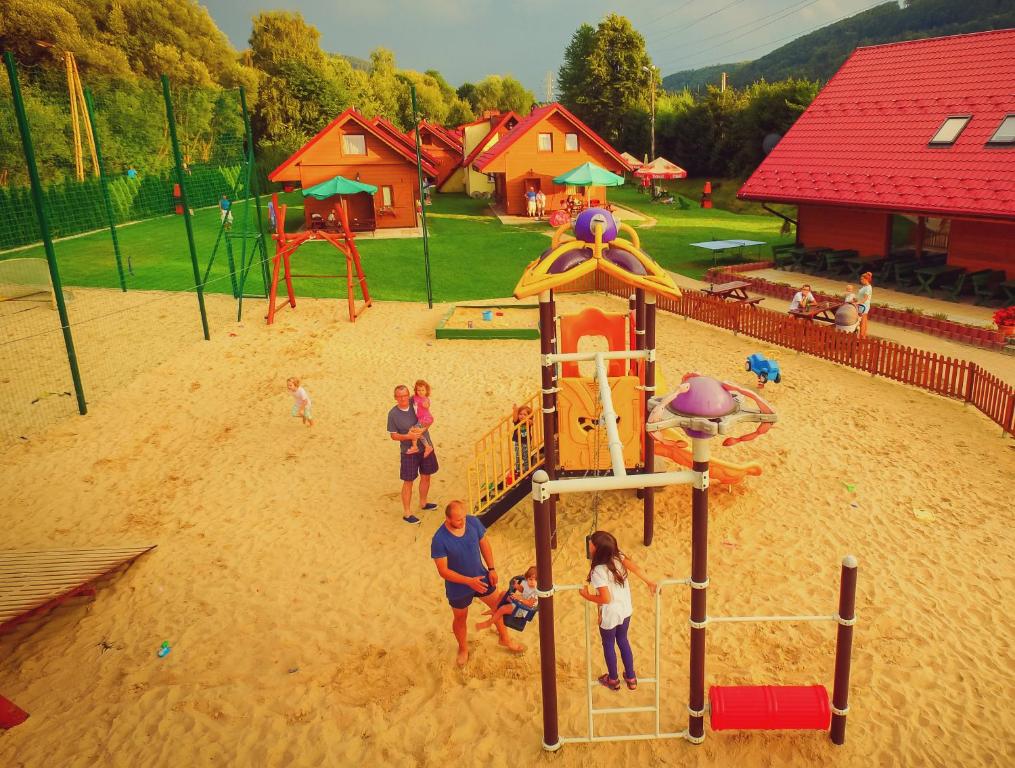 a group of people playing in a playground at Ośrodek Wypoczynkowy "u Krzysia" in Ustroń