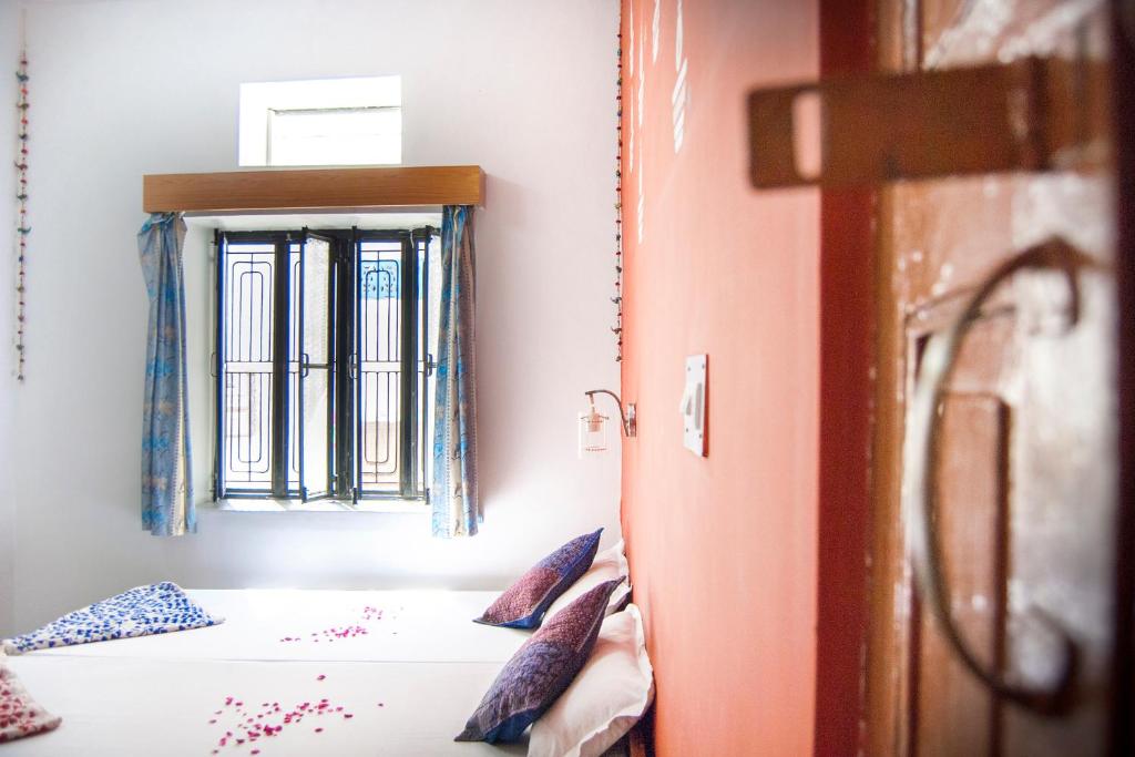 Postel nebo postele na pokoji v ubytování Hotel Rising Star