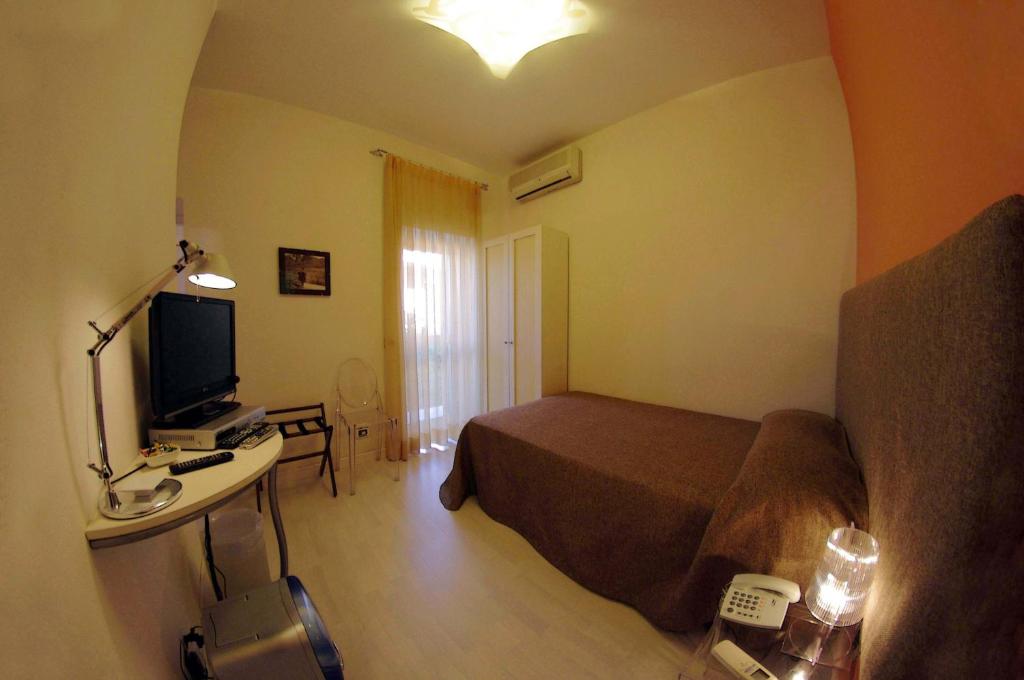 TV a/nebo společenská místnost v ubytování La Piccola Locanda