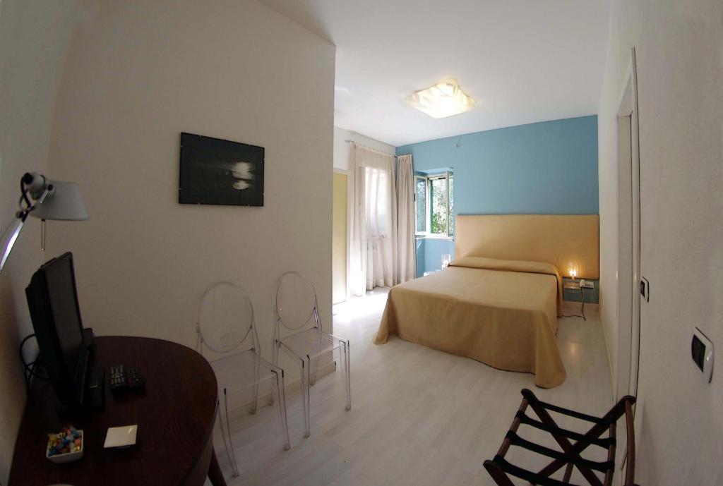 Postel nebo postele na pokoji v ubytování La Piccola Locanda