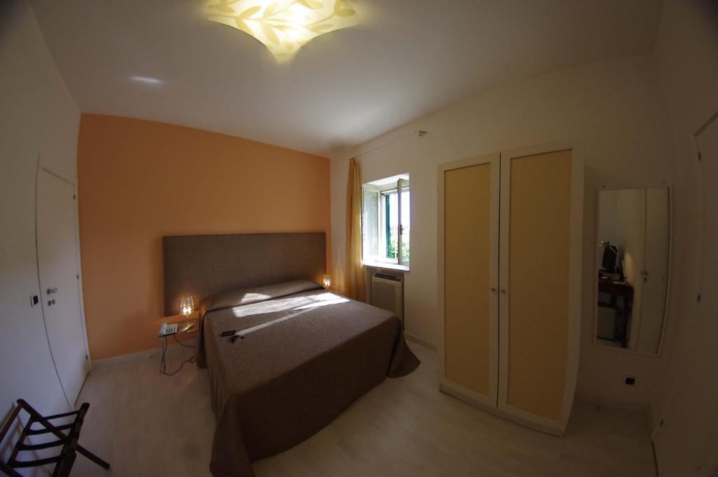 Postel nebo postele na pokoji v ubytování La Piccola Locanda