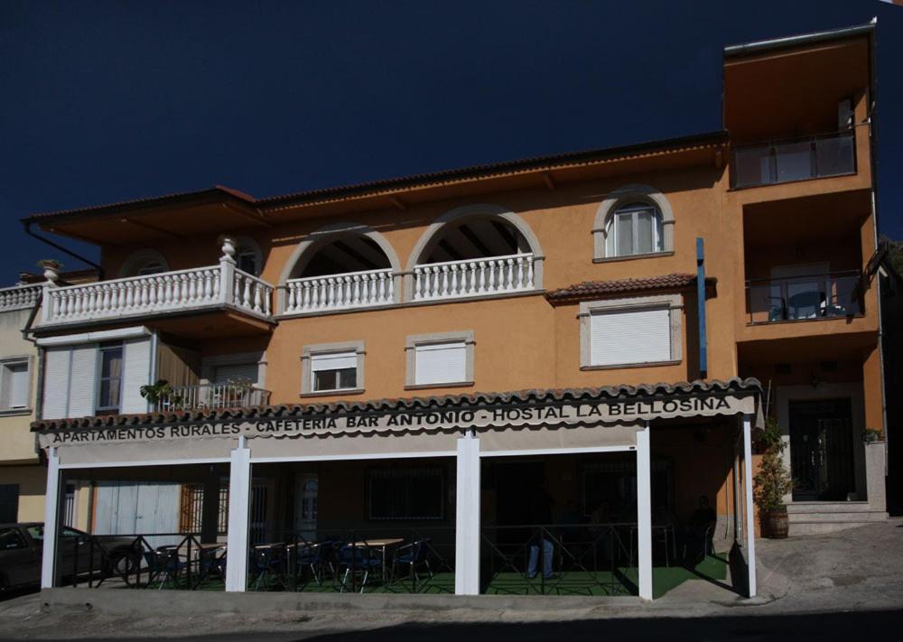 a large building with a balcony on top of it at Alojamiento rural la Bellosina in Cabezabellosa
