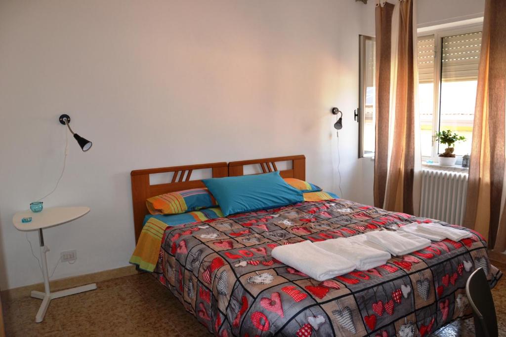 Postel nebo postele na pokoji v ubytování B&B CASA CRISTALLO