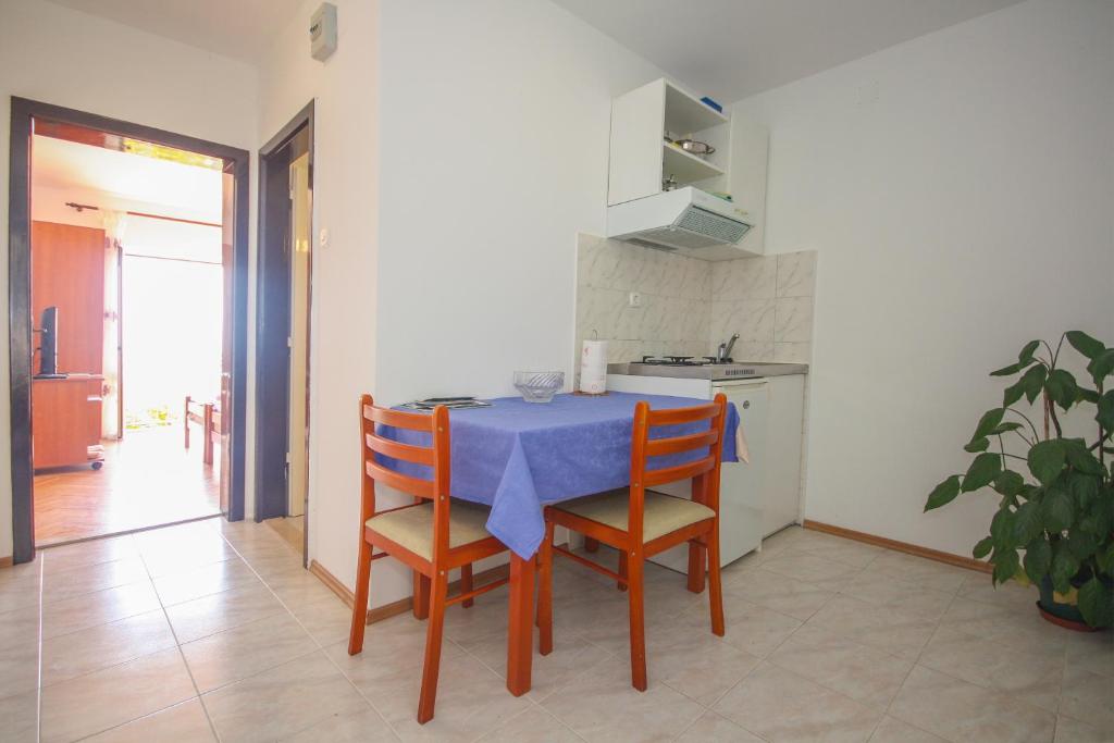 Kuchyňa alebo kuchynka v ubytovaní Apartments Beslema