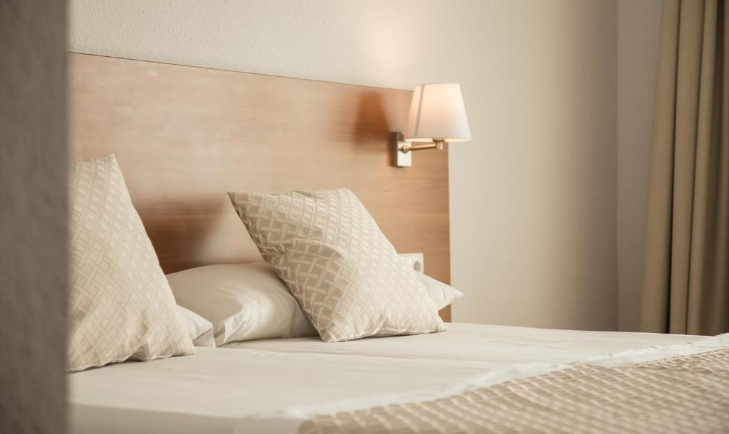 Cama o camas de una habitación en Carlos III