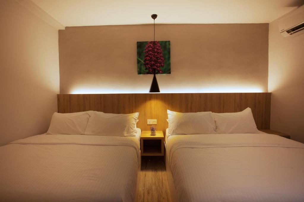 Postel nebo postele na pokoji v ubytování The Marion Hotel