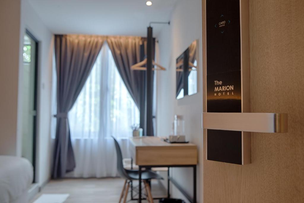 TV a/nebo společenská místnost v ubytování The Marion Hotel