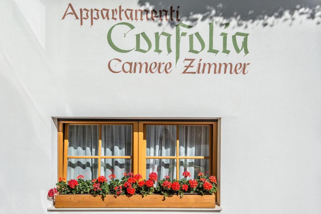 Certifikát, hodnocení, plakát nebo jiný dokument vystavený v ubytování Ciasa Confolia