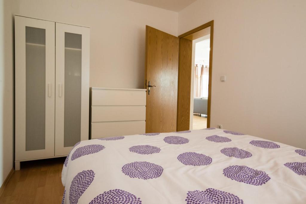 Posteľ alebo postele v izbe v ubytovaní Ferienhaus Bucic