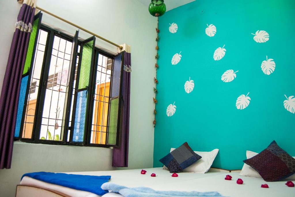 Postel nebo postele na pokoji v ubytování Hotel Rising Star