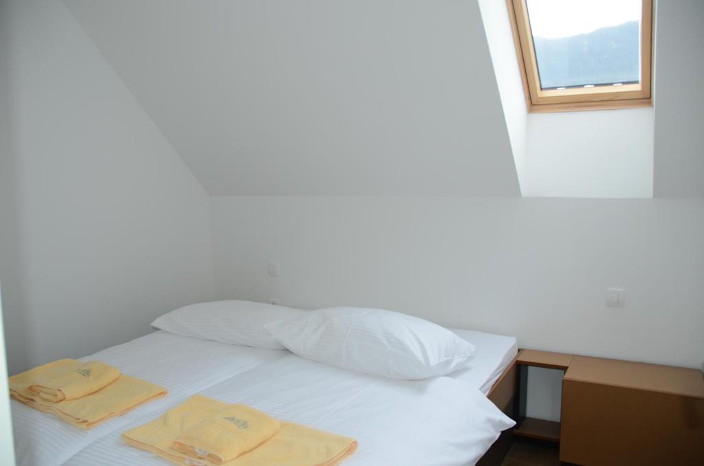 Postel nebo postele na pokoji v ubytování Hotel Sanje ob Soči ***/****