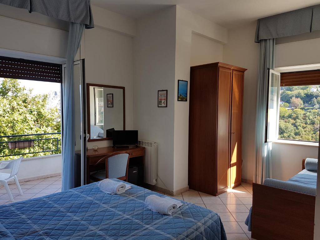 Postel nebo postele na pokoji v ubytování Hotel Bellavista