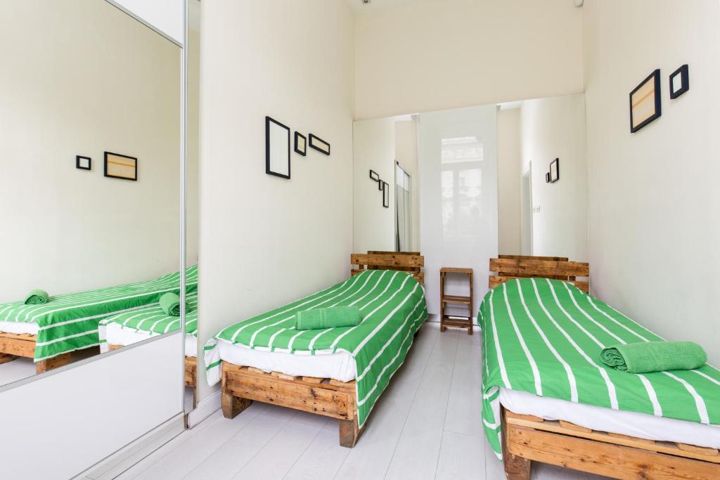 Posteľ alebo postele v izbe v ubytovaní Jozsef63 Apartment