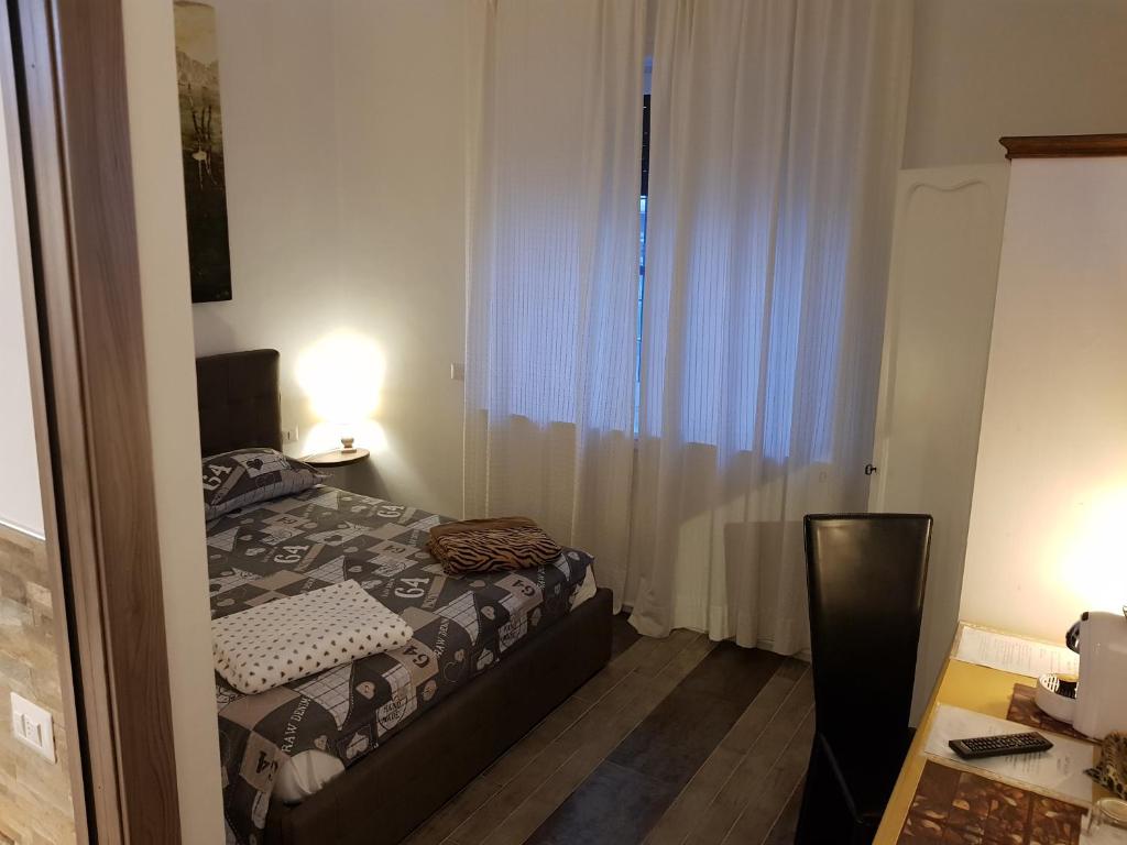 Postel nebo postele na pokoji v ubytování B&B Sansiromilano