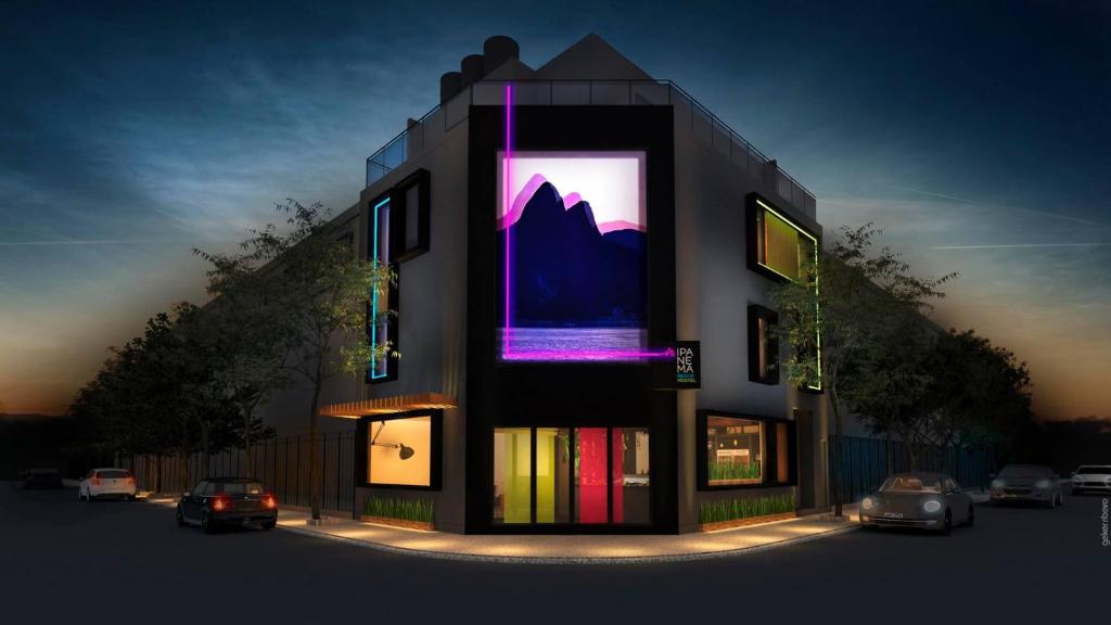 a building with a large window on the side of it at Ipanema Beach Hostel in Rio de Janeiro