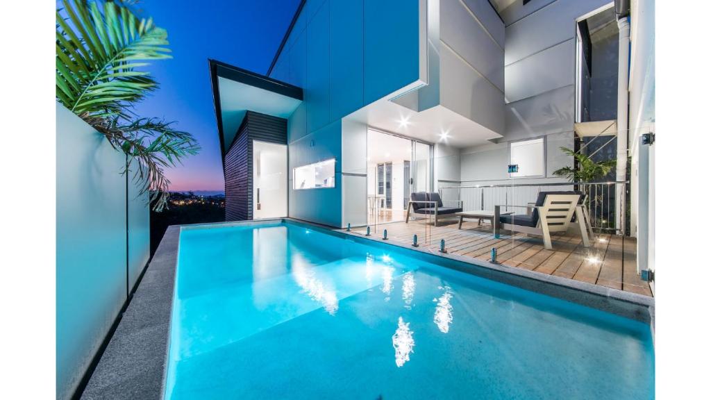 Πισίνα στο ή κοντά στο Oleander Holiday Home - Airlie Beach
