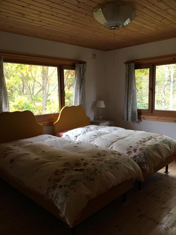 Tempat tidur dalam kamar di Ohisama House