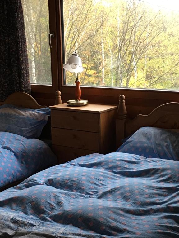 Tempat tidur dalam kamar di Ohisama House