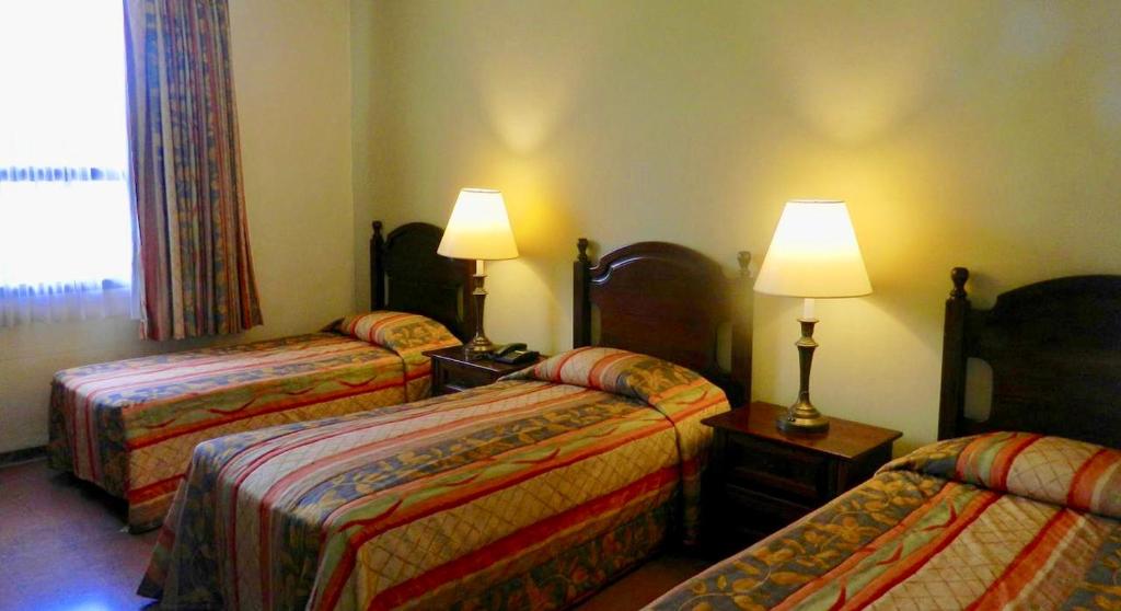 Hotel Santa Maria de Comayagua - Dreibettzimmer