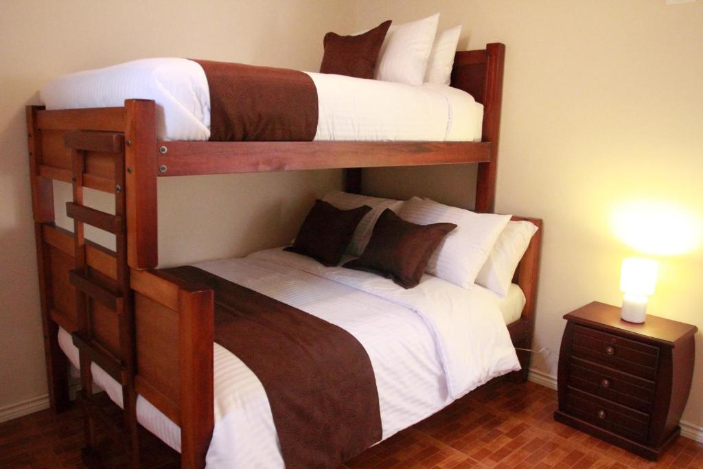Postel nebo postele na pokoji v ubytování El Patio Hostel Quito