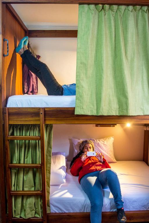 Postel nebo postele na pokoji v ubytování El Patio Hostel Quito