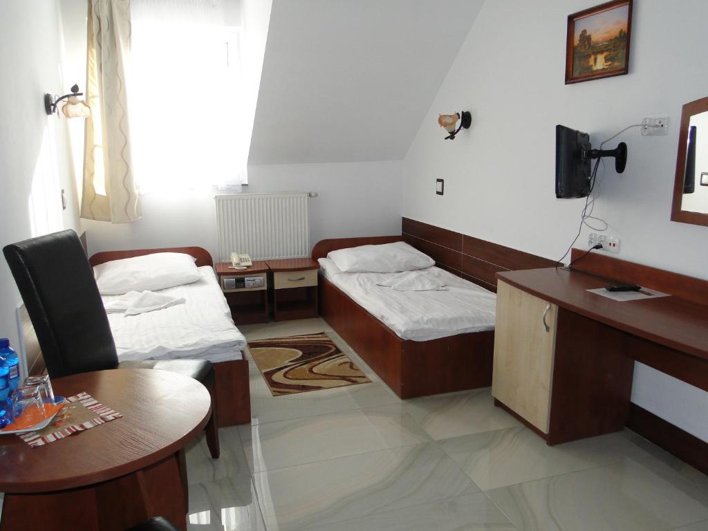 Łóżko lub łóżka w pokoju w obiekcie Hotel Agat & SPA