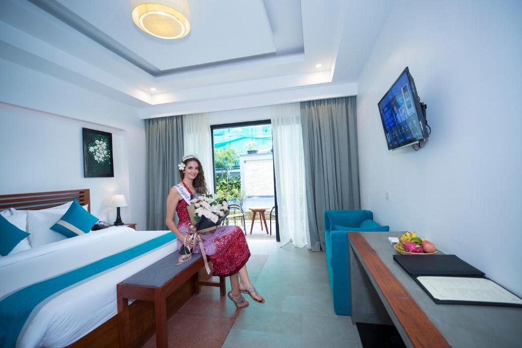 TV a/nebo společenská místnost v ubytování The Tito Suite Residence