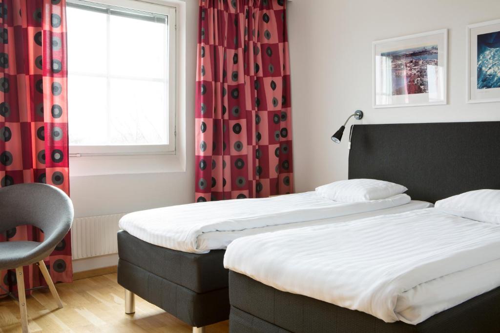 Postel nebo postele na pokoji v ubytování Comfort Hotel Arctic