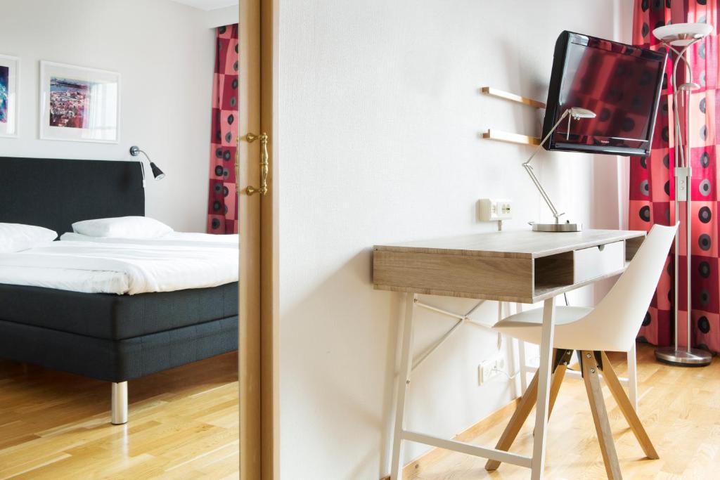 Postel nebo postele na pokoji v ubytování Comfort Hotel Arctic