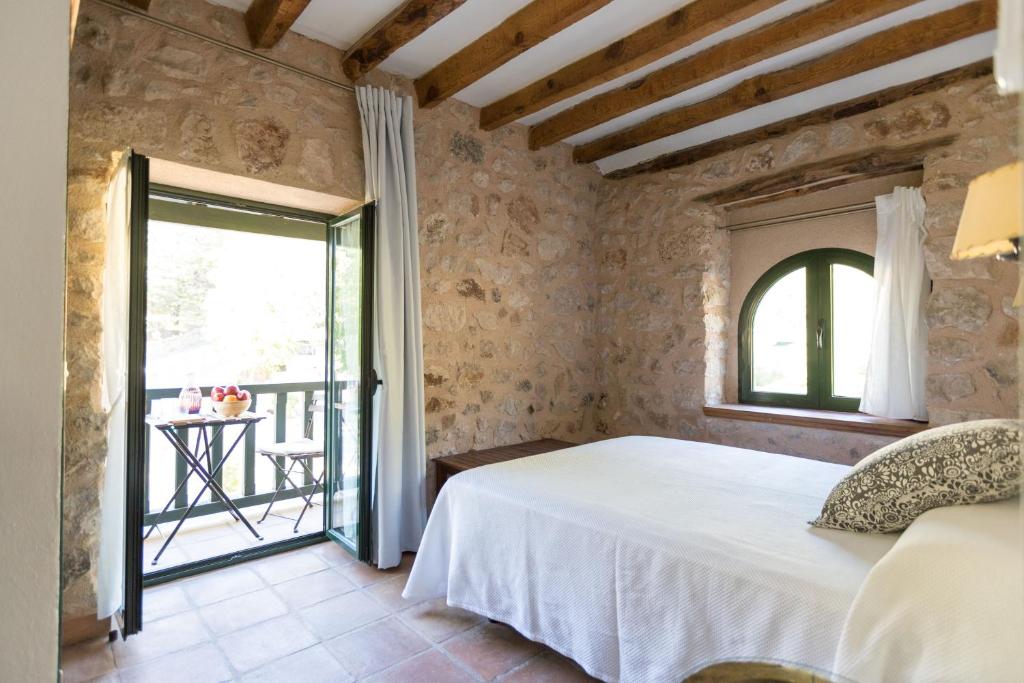 Postel nebo postele na pokoji v ubytování CALERILLA Hotel