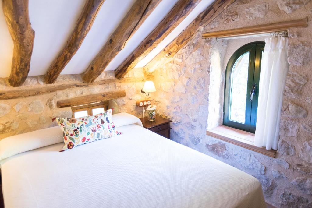 Postel nebo postele na pokoji v ubytování CALERILLA Hotel