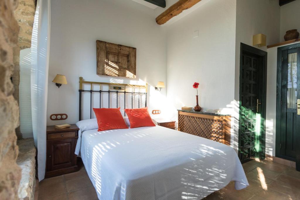 Postel nebo postele na pokoji v ubytování CALERILLA Hotel